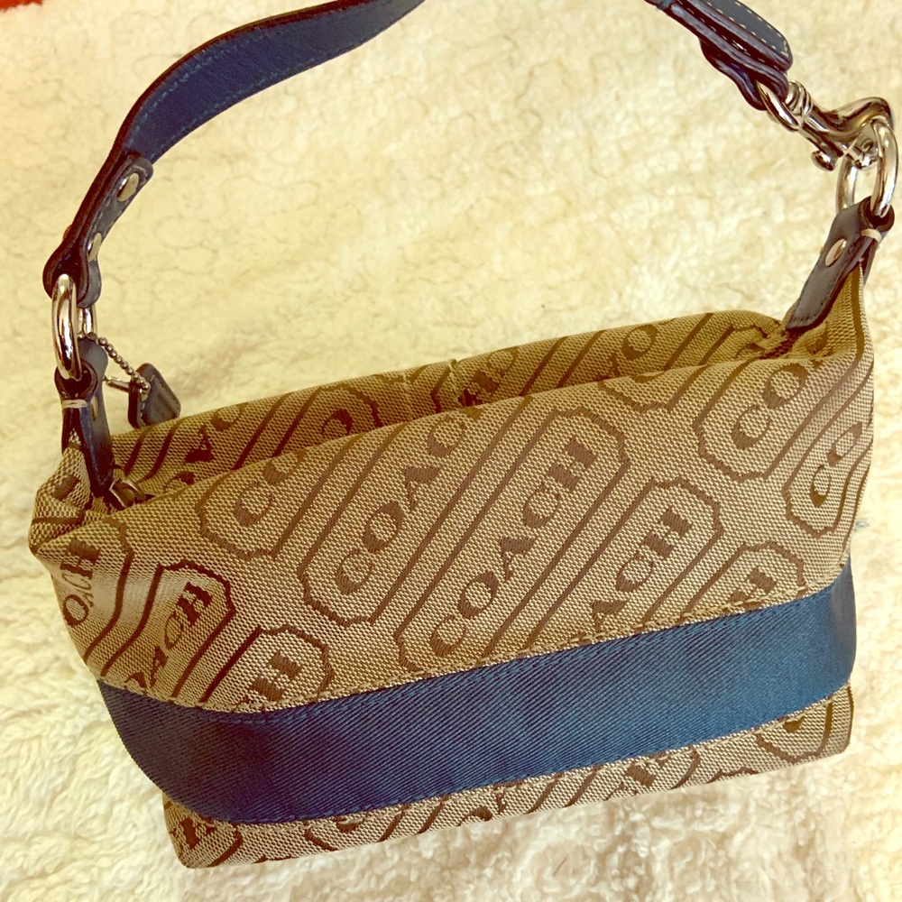 Small tan and teal coach purse